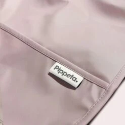 Pippeta Waterproof Cape Sleeved Bib – Ash Rose 7 Pippeta Waterproof Cape Sleeved Bib – Ash Rose -Kiddies Kingdom Store Pippeta sleeved bib rose 4