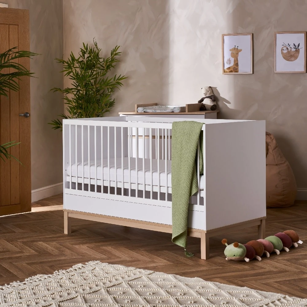Obaby Astrid Cot Bed – White/Oak 1 Obaby Astrid Cot Bed – White/Oak
